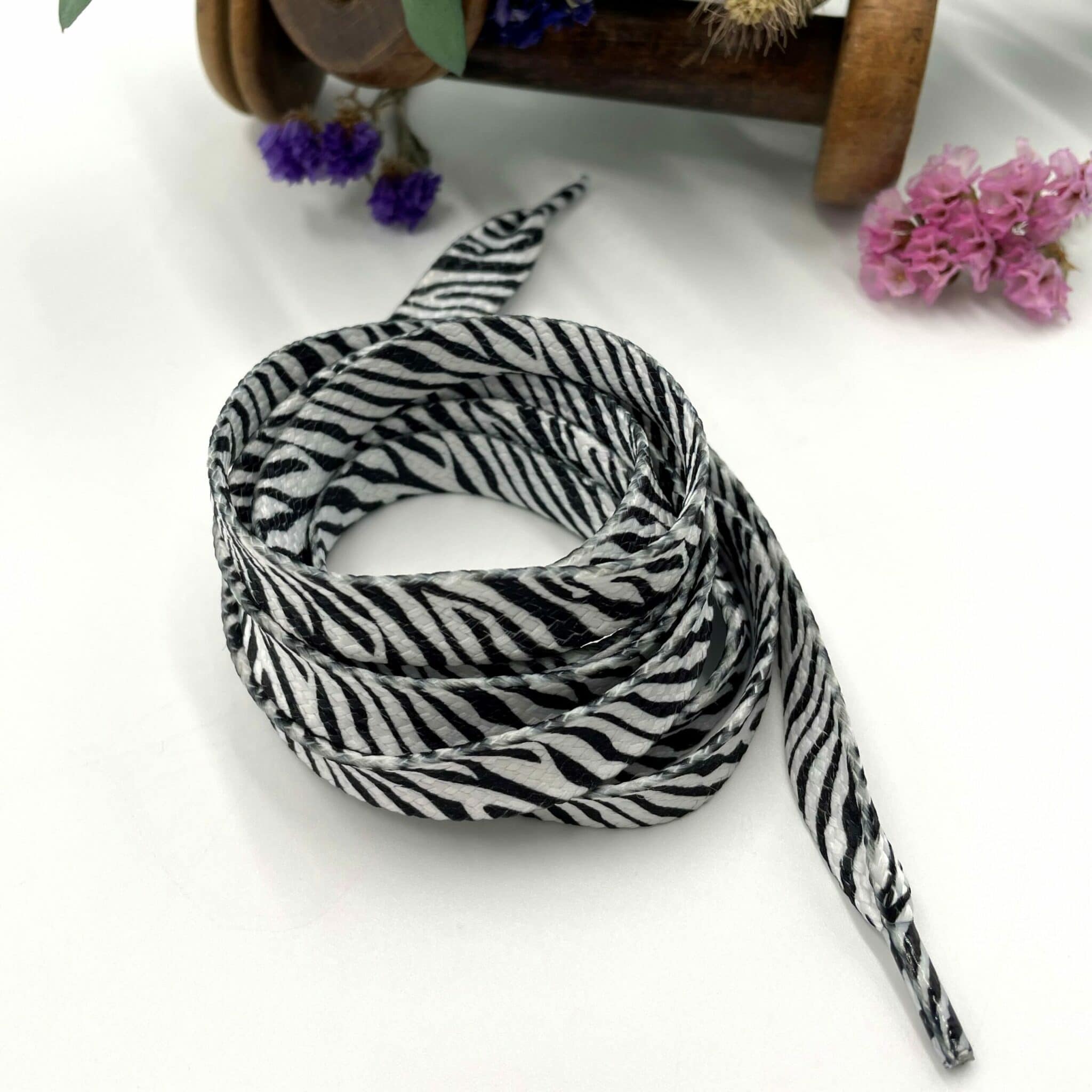 Lacet sérigraphié motif zebre noir et blanc plat